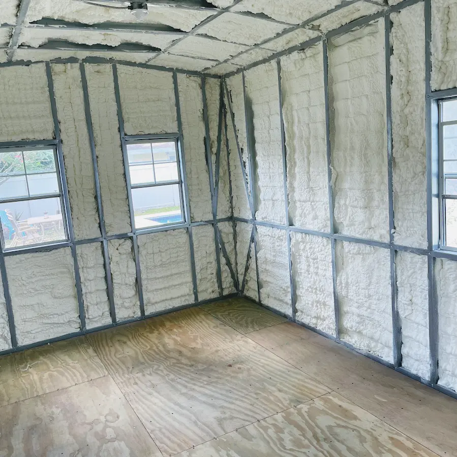 Closed-cell spray foam insulation applied to wall cavities in a residential project in Azle